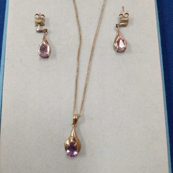 Vintage sterling silver necklace and earring set with amethyst stones.
