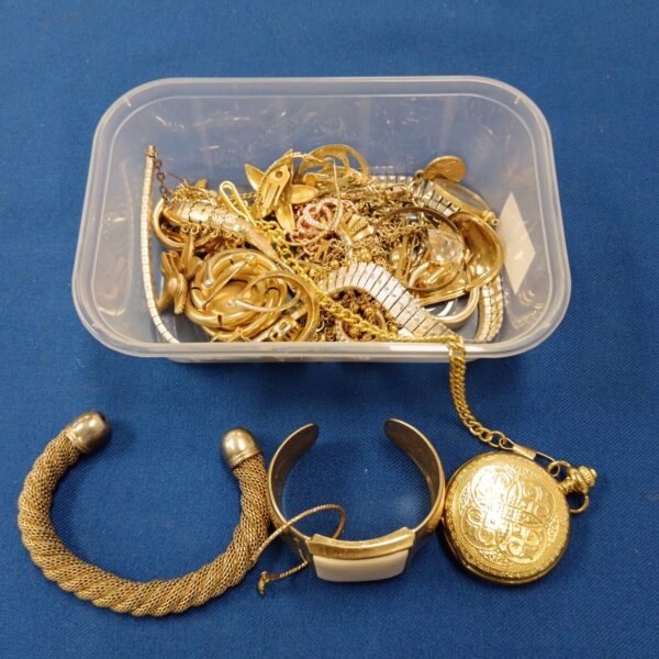Tray of gold plated jewellery and vintage pocket watch.