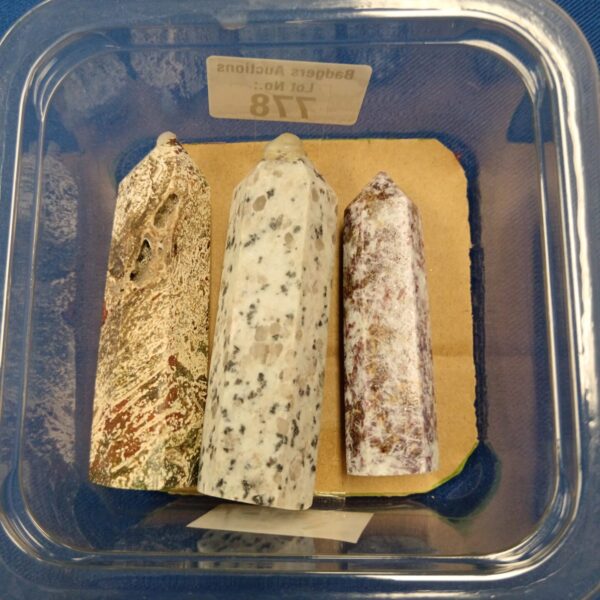 Lot of three semi precious stone columns for display.