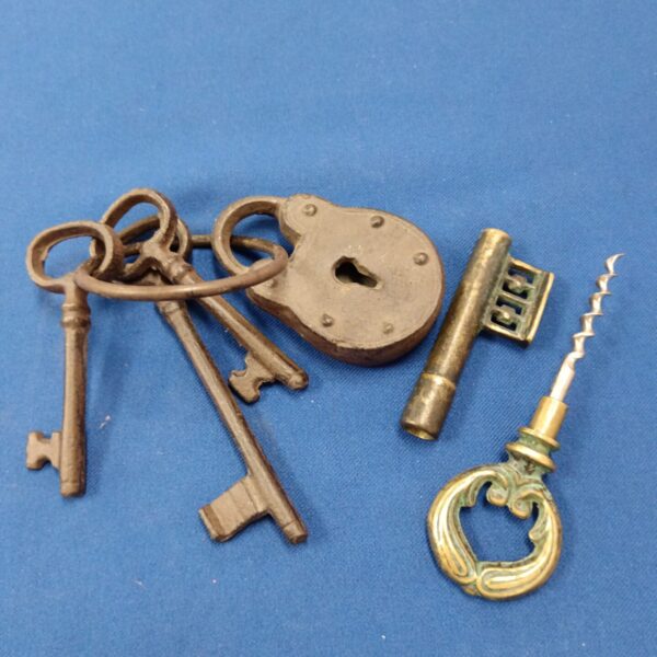 Antique keys and padlock set, vintage collectible keys.