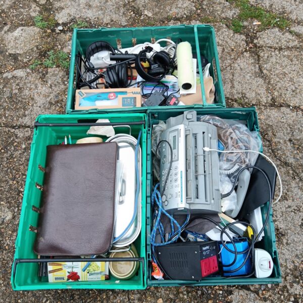 House clearance lot with tools, electronics, and vintage items.