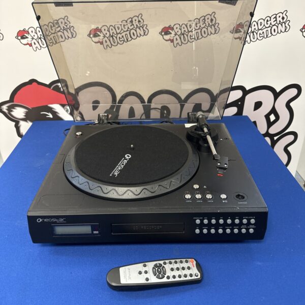 Neostar record player with remote control on a blue surface.