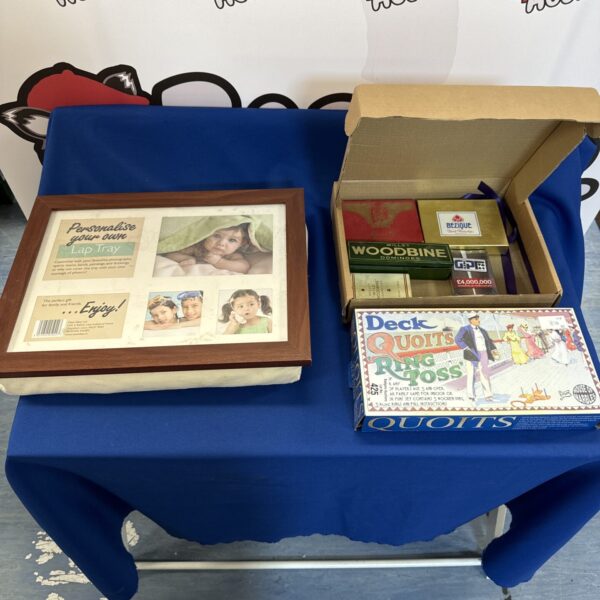 Vintage quoits game and photographic lap tray collection.