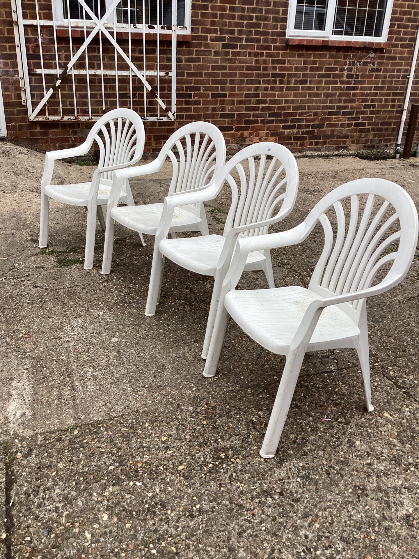 1059 Four White Garden Chairs