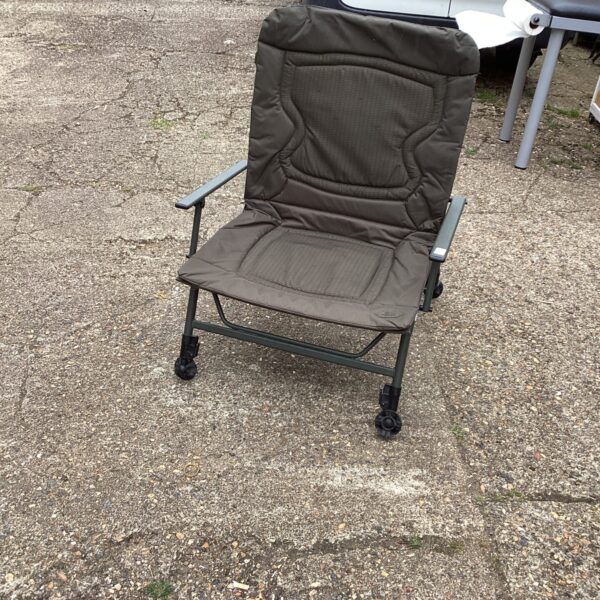 Padded folding fishing chair for comfortable outdoor seating.