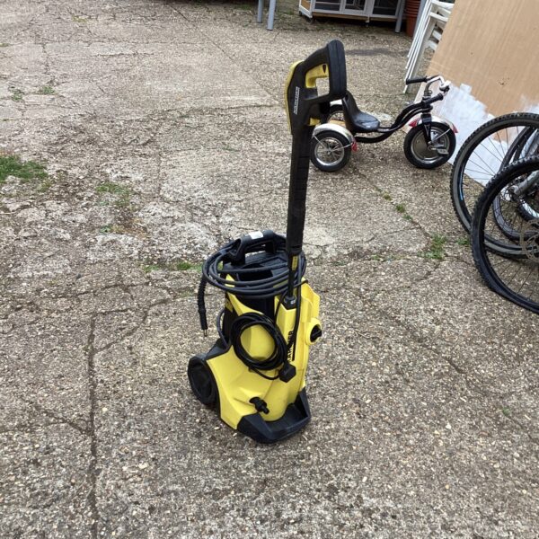 Used Karcher K4 power washer for garden and patio cleaning.