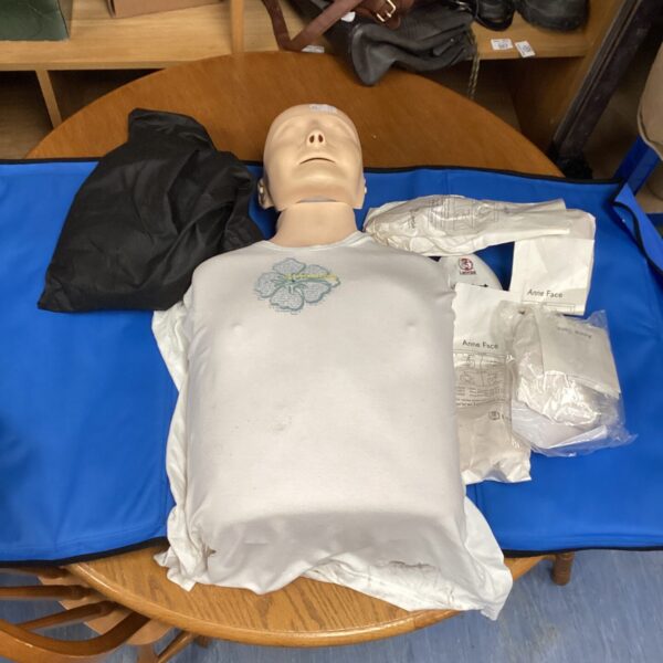 Laerdal Annie CPR dummy for medical training and first aid practice.
