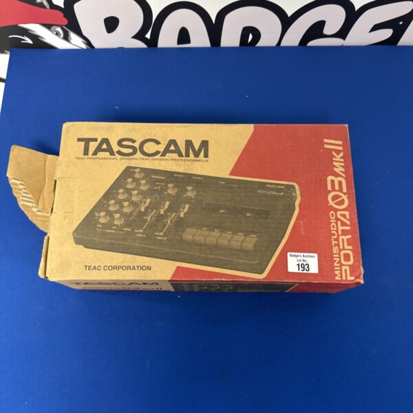 Vintage Tascam Porta Studio 03 MKII four-track recorder in detail.
