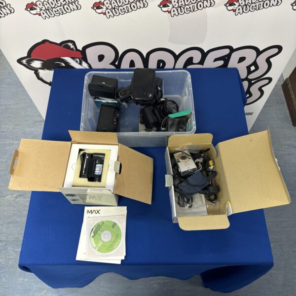 Vintage camera lot including Canon, Lumix, and Kodak cameras.