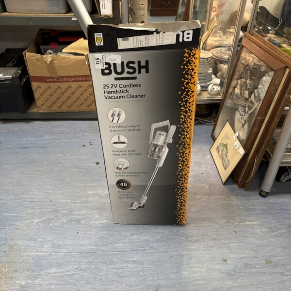 Bush cordless vacuum cleaner with charger and attachment.