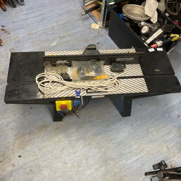 Used Wolfcraft power table workbench for DIY projects.