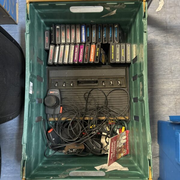 Vintage Atari Video Computer System with array of games.