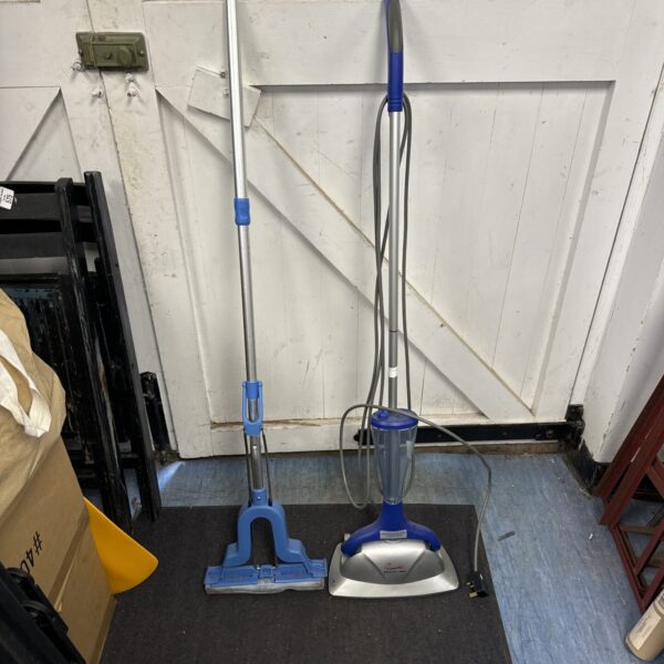 Hometek steam mop with telescopic handle for floor cleaning.