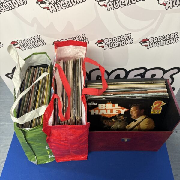Large lot of mixed vinyl records for sale.