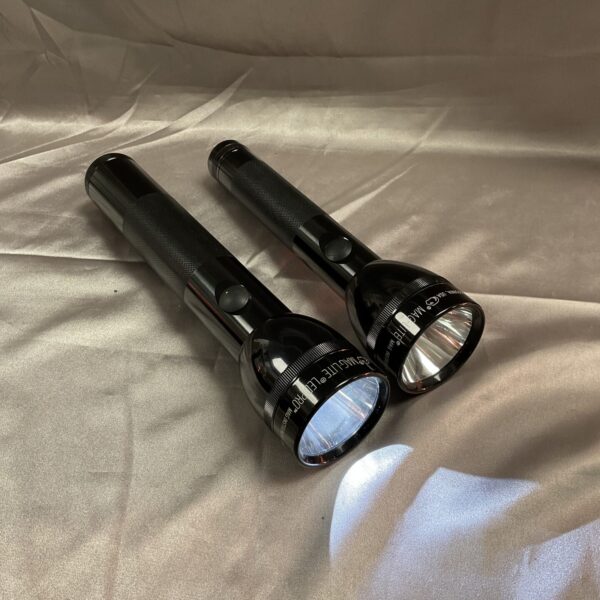 Pair of vintage Maglite torches, classic handheld lighting solutions.