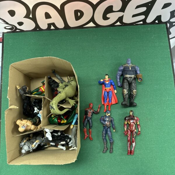 Marvel action figure lot including Spider-Man, Iron Man, and Thanos.
