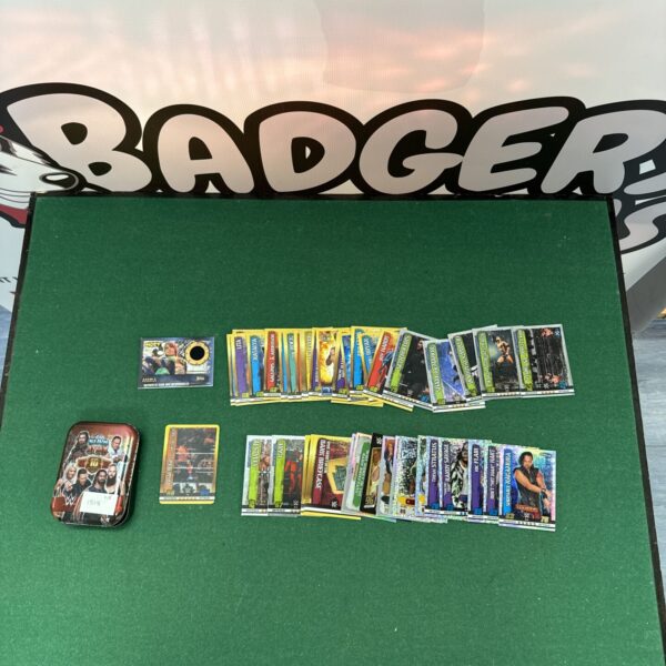 WWE Slam Attax trading cards collection featuring wrestling superstars.