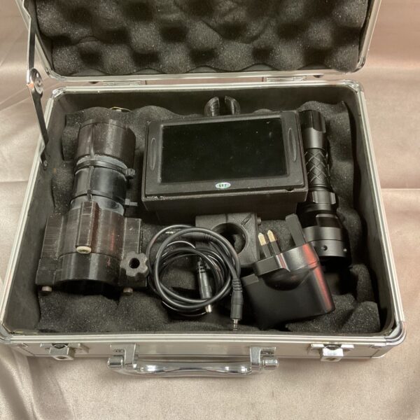 Night vision kit with monocular and recording unit in a carrying case.