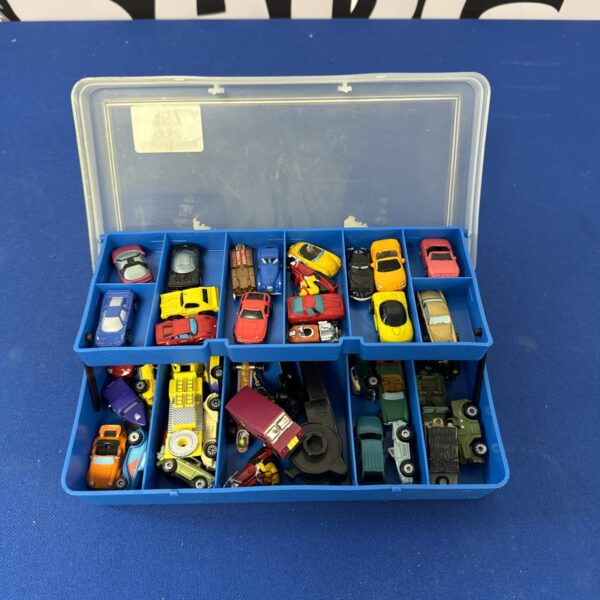 Tray of Galoob Micro Machines cars and trucks.
