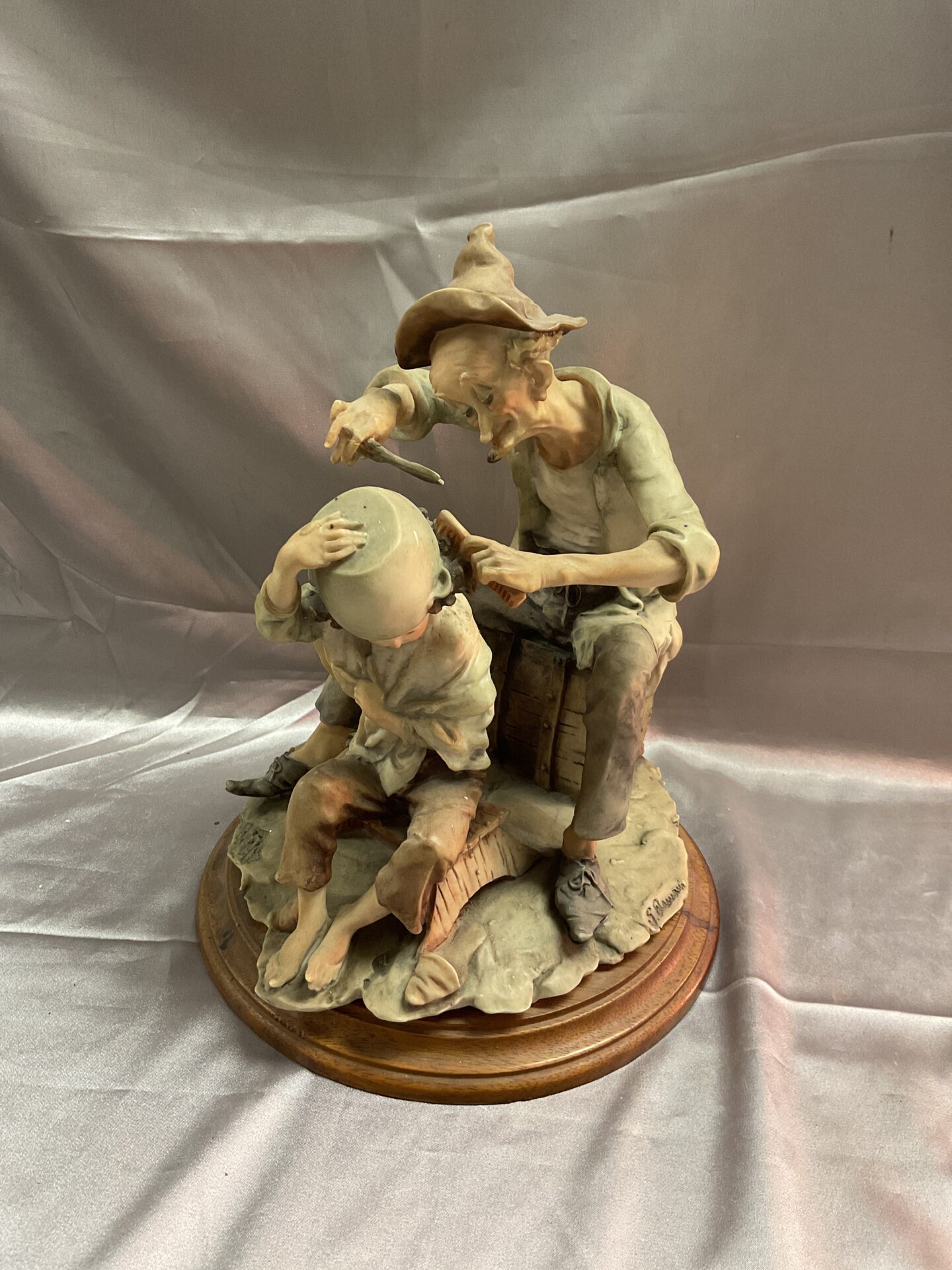 841 Signed Capo de monte boy having pudding basin haircut