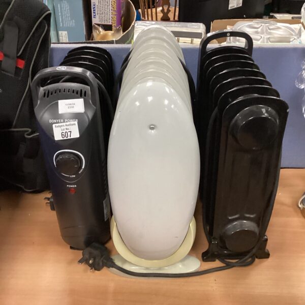 Small desk heater presented for auction, ideal for personal use.
