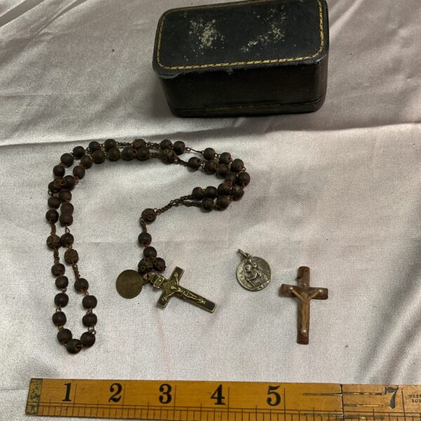 Vintage rosary beads with crucifix and St Christopher medal.