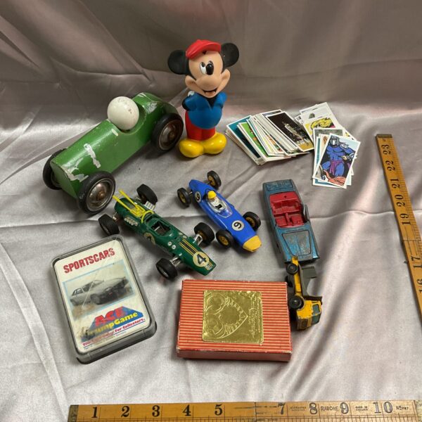 Vintage Scalextric cars and toy card box, collectible toy lot.