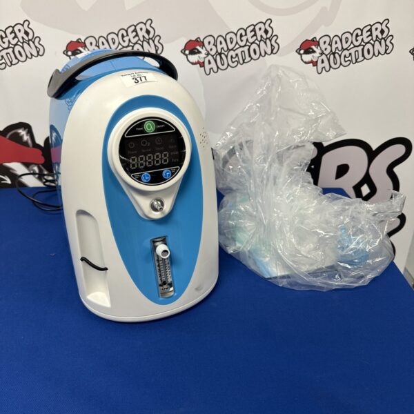 Portable Hinor oxygen concentrator machine with digital display.