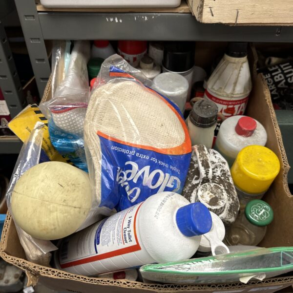 Mixed shed clearance lot with cleaning supplies and gloves.
