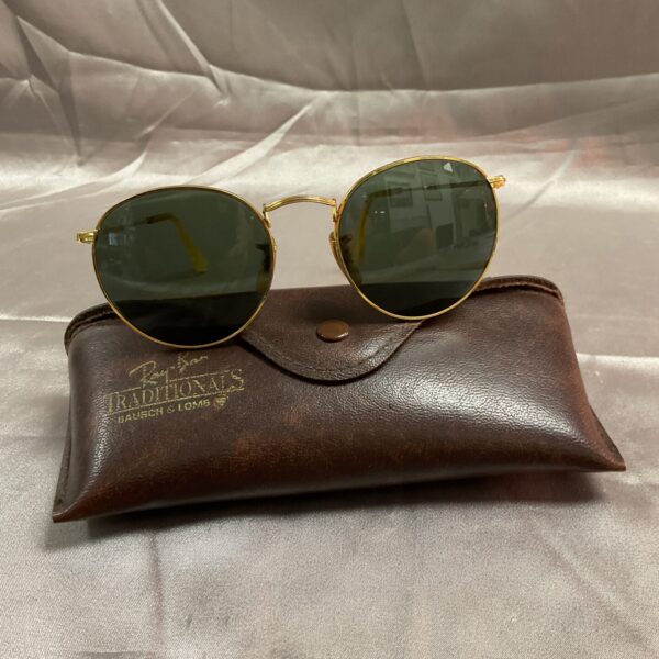 Vintage Ray Ban Traditionals sunglasses with gold frame.