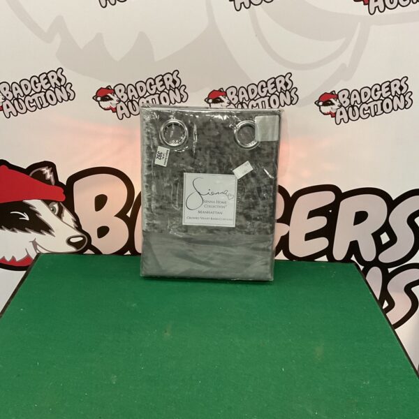 Black crushed velvet curtains with band detail for stage or home.
