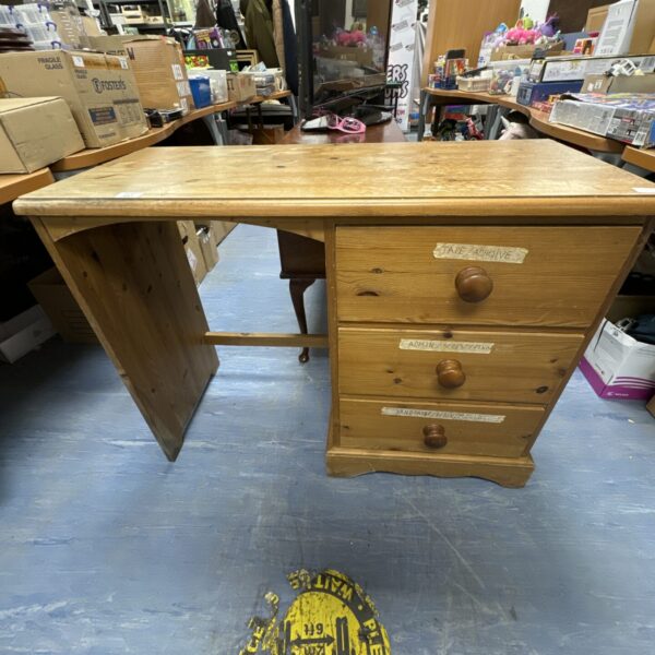 Vintage pine desk unit with three drawers, ideal for office or home.
