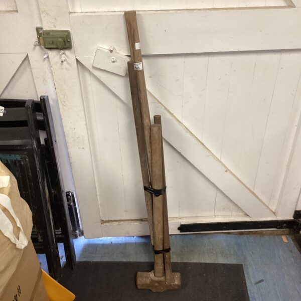 Vintage garden tool, heavy-duty sledgehammer for outdoor work.
