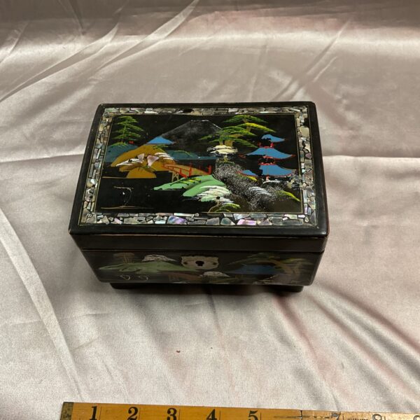 Vintage Japanese musical jewellery box with mother of pearl inlay.