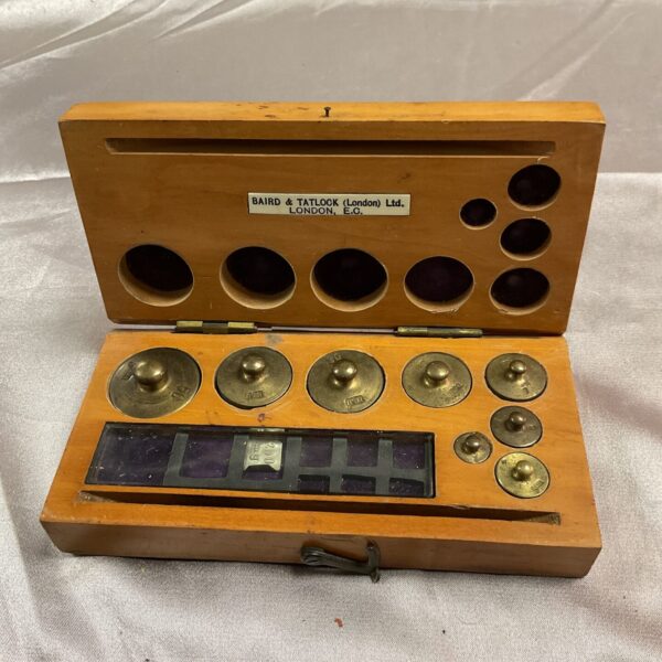 Vintage Baird and Tatlock London weights in wooden box.