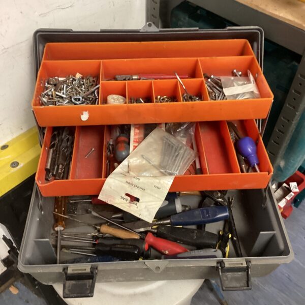 Vintage Holt toolbox filled with tools and hardware.