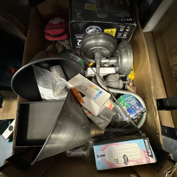Mixed lot of lightbulbs and funnels for workshop use.