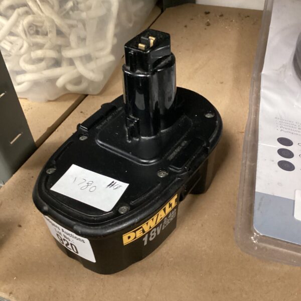DeWalt battery pack for cordless power tools, side view.