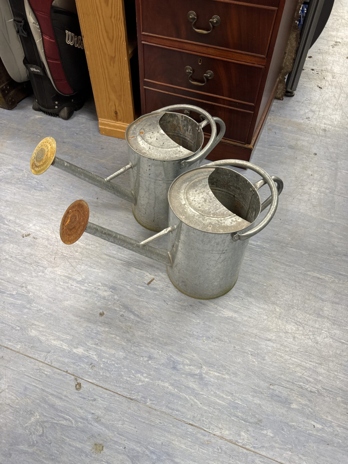 883 Two galvanised watering cans