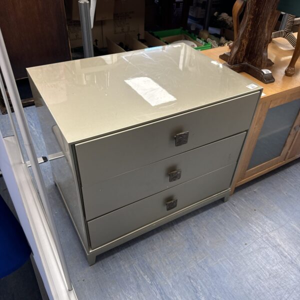 Vintage painted bedroom cabinet with three drawers.