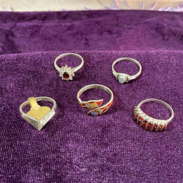 Lot of five 925 silver rings in various styles.
