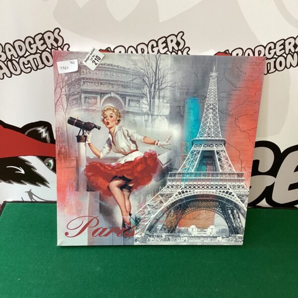 Vintage Paris canvas print featuring pin-up girl and Eiffel Tower.
