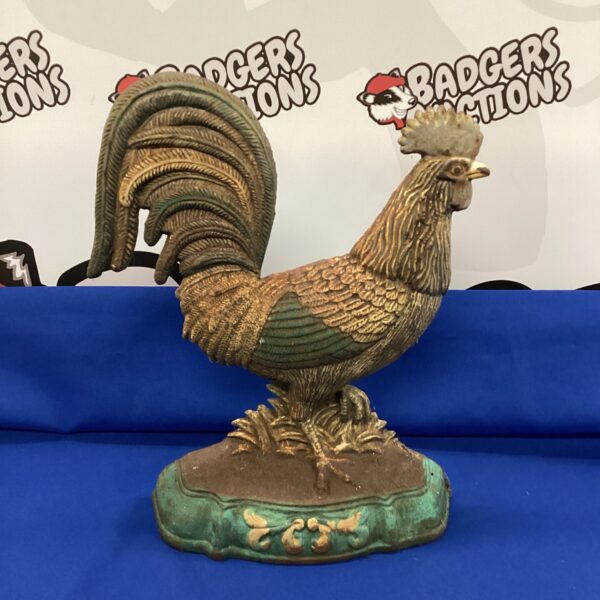 Vintage cast iron cockerel doorstop for farmhouse decor.