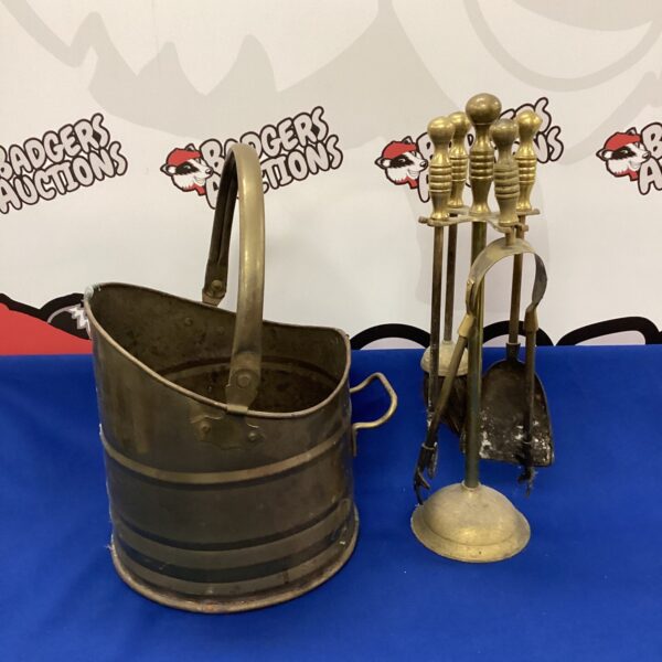 Vintage brass coal scuttle and companion set for fireplace use.