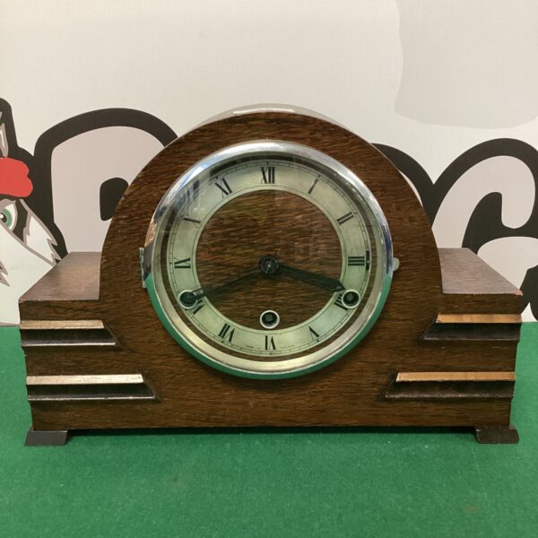 Vintage Art Deco mantle clock with Roman numeral dial.