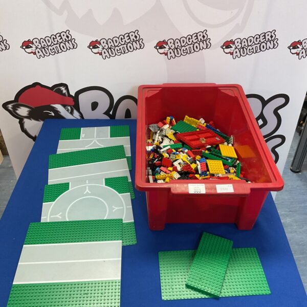 Mixed Lego lot with green baseplates for building.