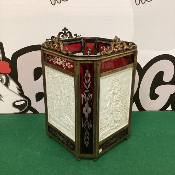 Vintage brass and ruby glass ceiling lantern with classical scenes.