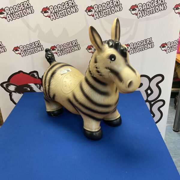 Vintage rubber zebra ride on toy for children’s play.