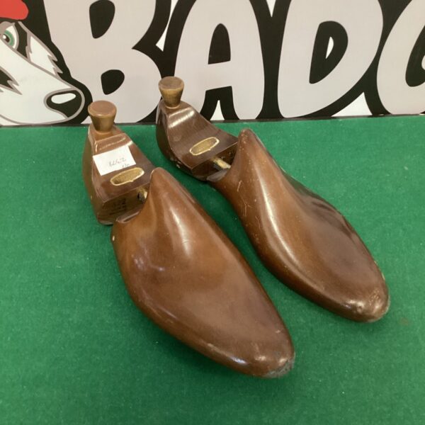 Vintage wooden Russell Bramley shoe stretchers for shoe care.