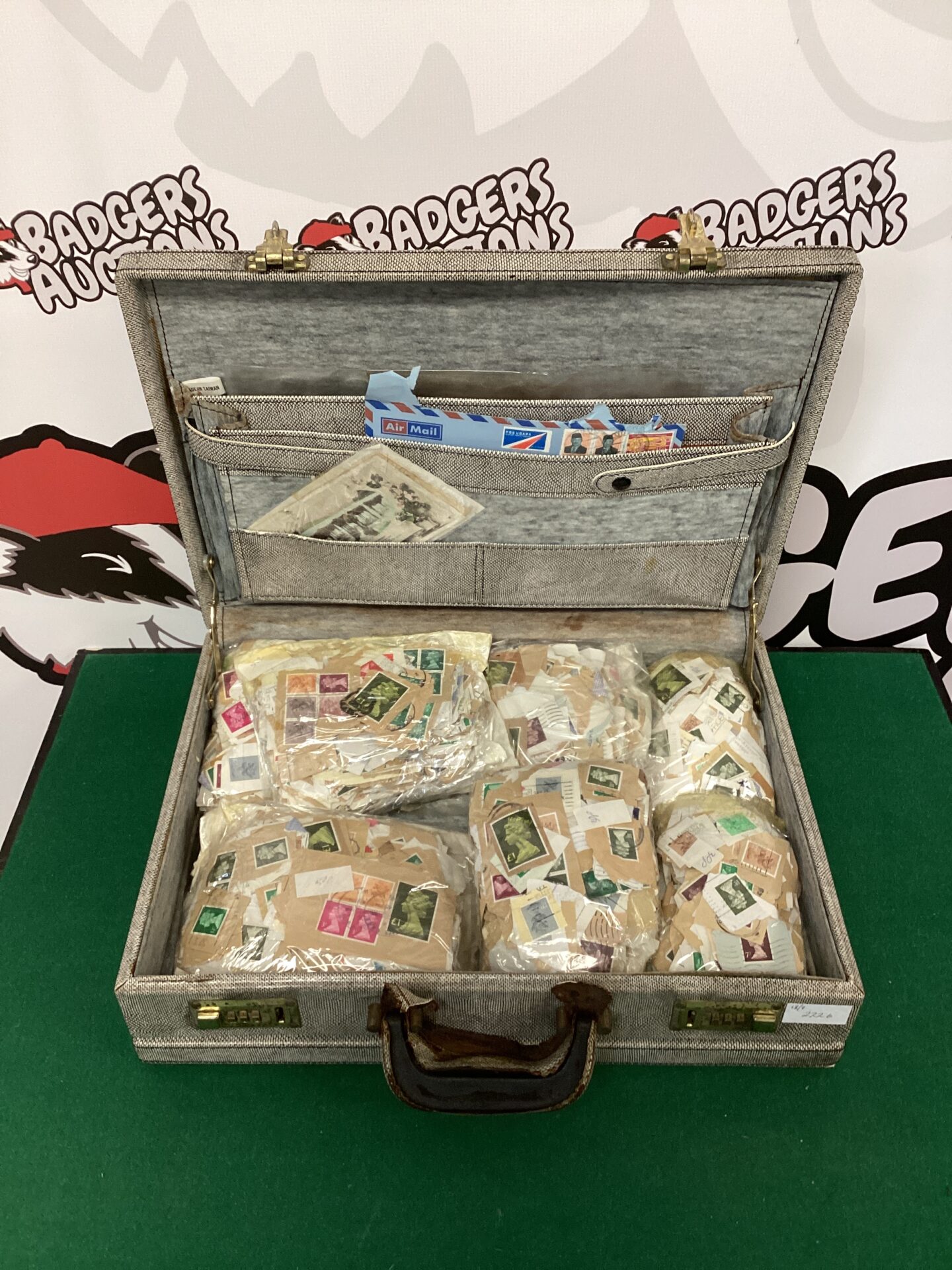 042 Vintage case full of postage stamps